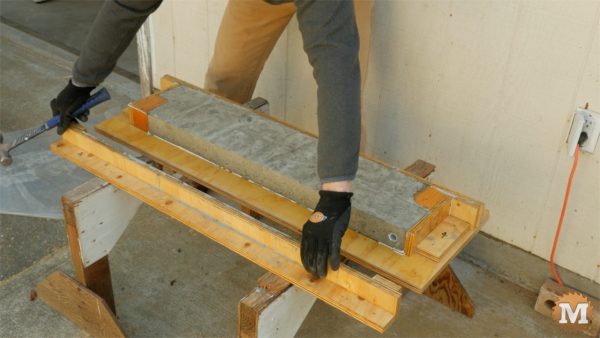 Remove screws and gently remove sides and ends - cast form mold concrete garden boxes