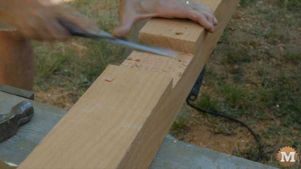 chisel cleans up a dado groove