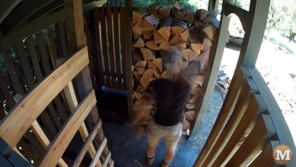Finally filling our new Timber Frame Woodshed. Stocked for winter - wood shed plans