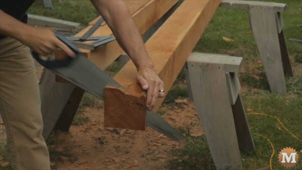 trim a beam with a handsaw