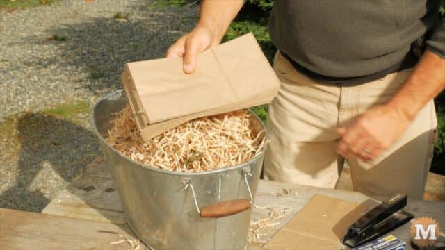 Dried fire shavings and paper lunch bags
