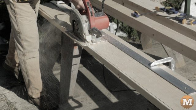ripping lumber with circular saw and guide