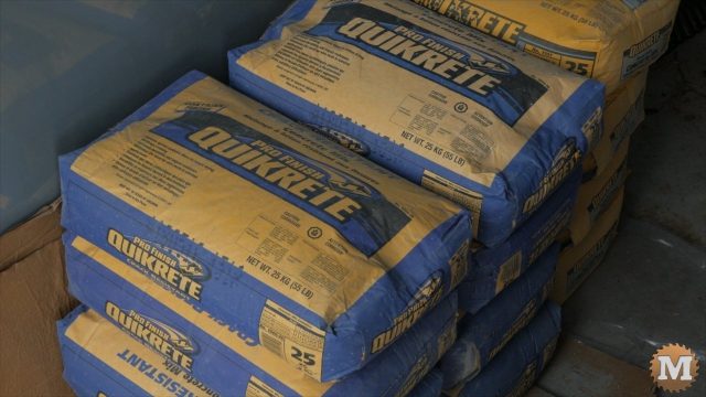 bags of quickrete concrete mix with added fiber