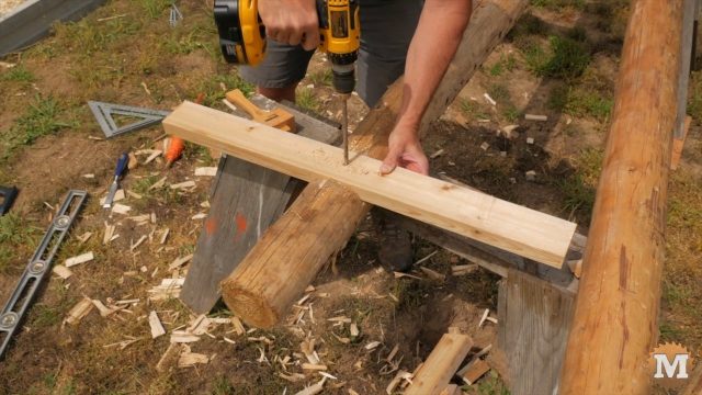 constructing the Raspberry Trellis from cedar posts and 2x4\'s