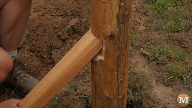 setting the posts in the holes