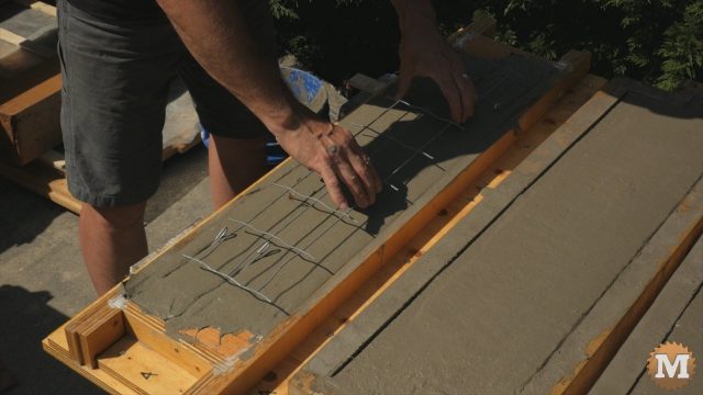 Adding galvanized wire grid after aircrete thickens