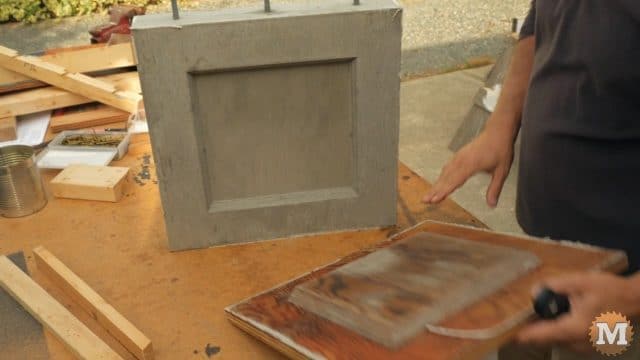 stripping the forms from the concrete casting