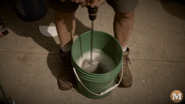 making foam in a pail with a paint mixer attachment on a drill
