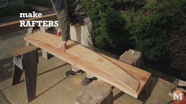 Construction of a cedar pergola designed with curved rafters and curved corner braces