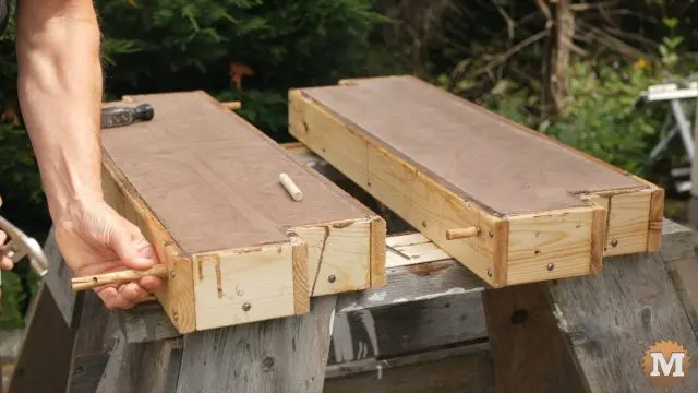 Concrete Garden Box Easy Form - removing wooden pegs