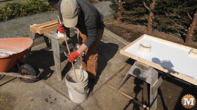 Cast your own Concrete Countertop for a Potting Bench with a Galvanized Corrugated Metal Roof