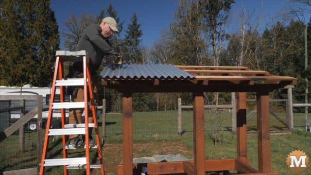 Make a Potting Bench with a Cast Concrete Countertop and Galvanized Corrugated Metal Roof.