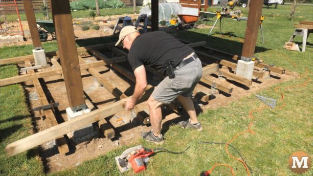Removing temporary 4x4's from deck frame construction
