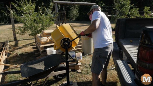 A small concrete mixer can handle two bags