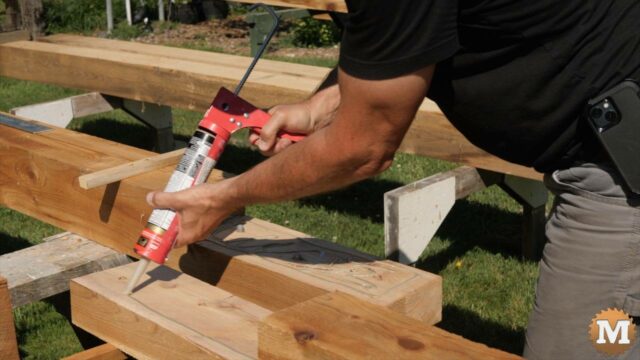 Adding construction adhesive to 6x6 cedar scarf joint