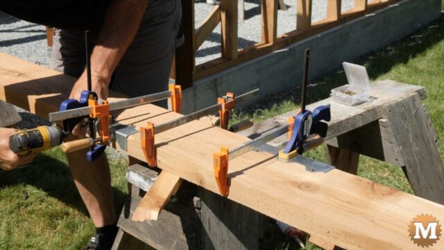 The 2x8 ridge beam is built in two pieces