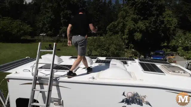 Final inspection of the solar panels on the roof of the RV