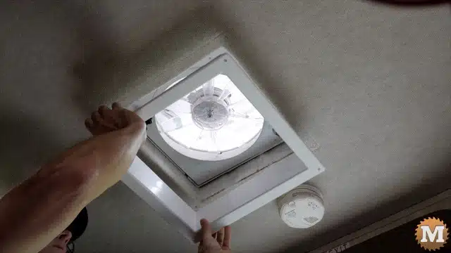removing the plastic ceiling fan ring