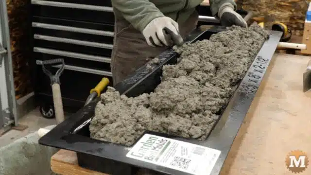 mounds of concrete added to the mold