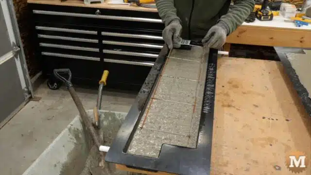 setting the wire grid onto the wet concrete