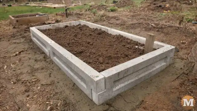 the finished concrete raised garden bed made from six 36 inch panels
